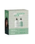 Alcove Duo Boucles Curl Duo packaging with two bottles on a tiled background