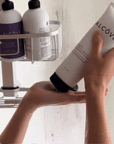 Gif showing someone use the Alcôve Hair Restructuring Mask Travel Size 55ml in a shower