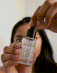 GIF showing a drop of the Bottle of Alcove Hair Pre-Wash Scalp Oil