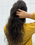 An example of what hair could look like if someone uses the best selling Alcôve Hair Curl Activator