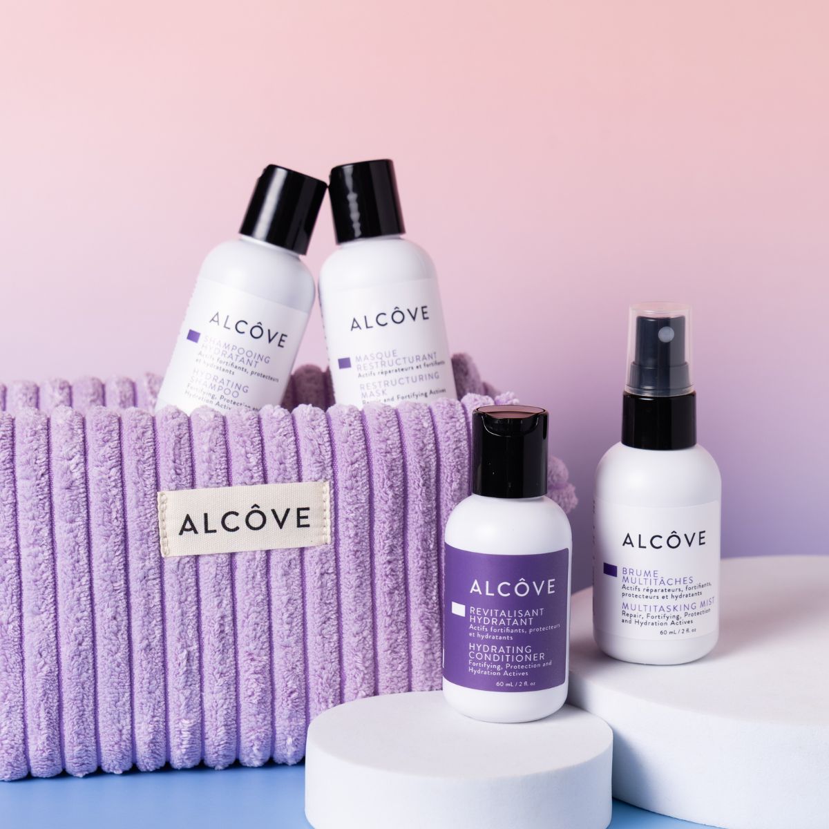 Alcove Mini Hair Products with a Purple Pouch