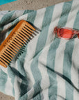 Lifestyle image showing the Alcôve Hair Bamboo Hair Comb