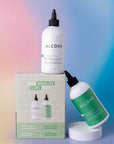 Alcove hair care products including bottles and a box on a gradient background