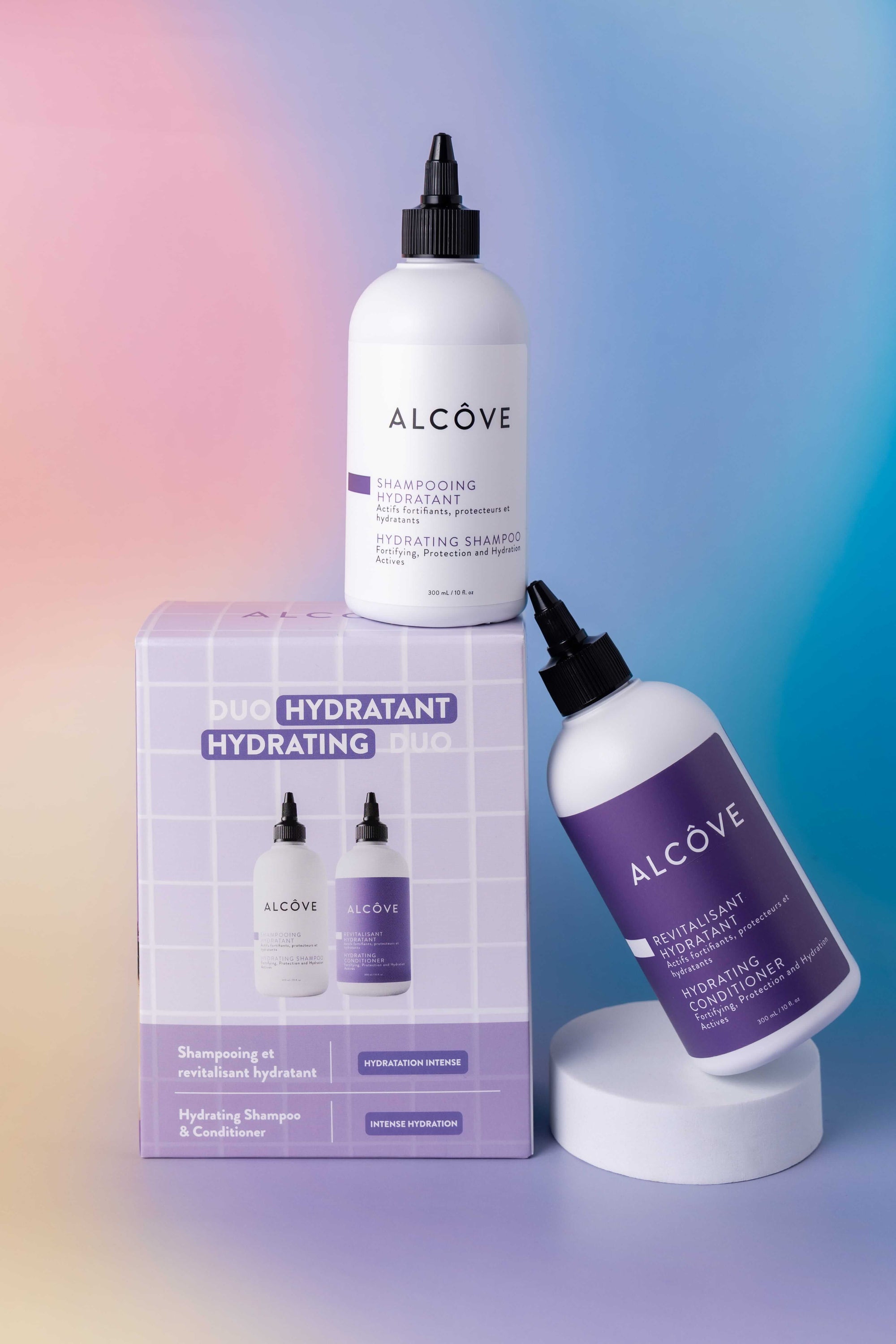 Alcove hair care products including shampoo, conditioner, and packaging on a gradient background