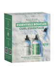 Alcove Curl Essentials packaging with bottles on a textured background