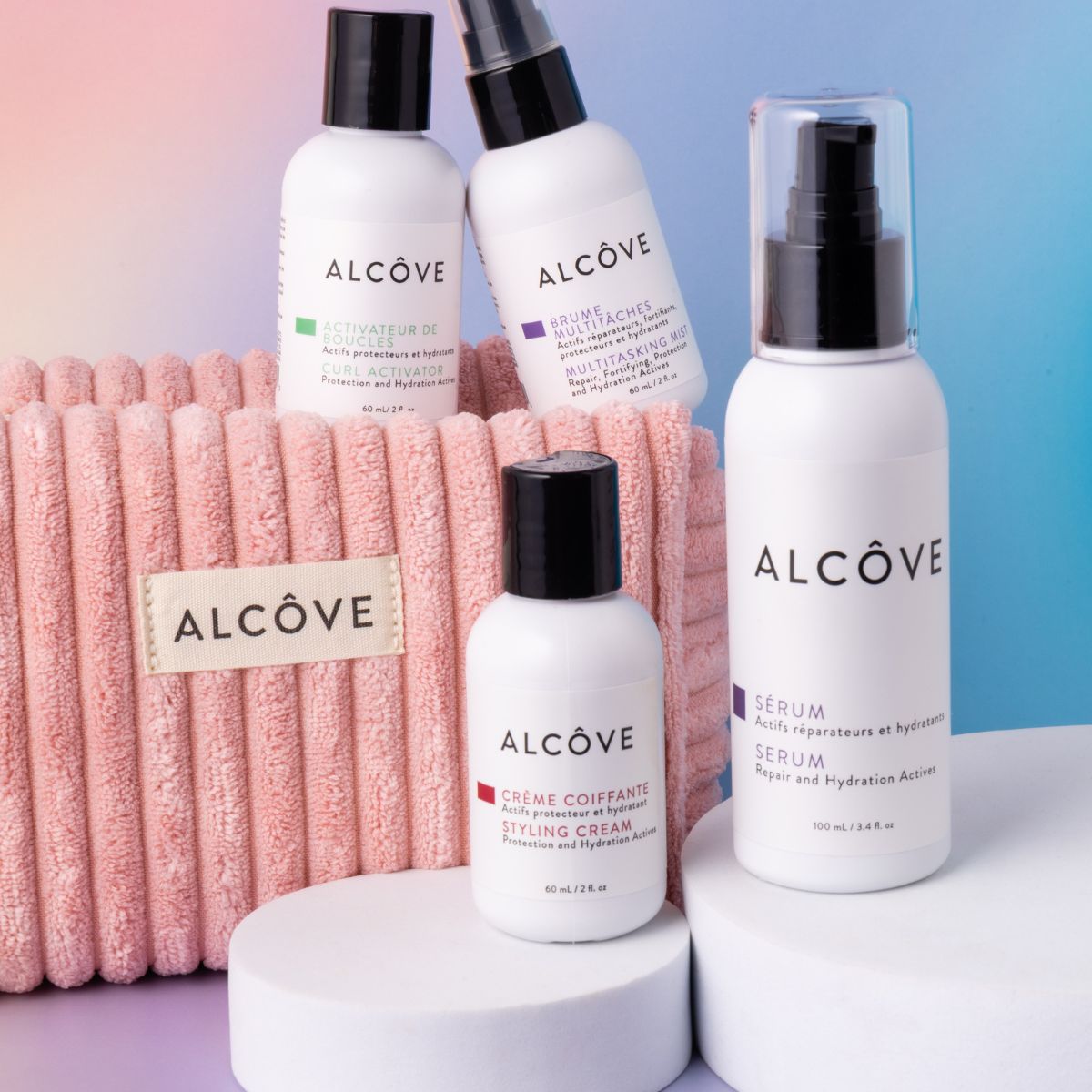 Set of Alcove hair care products on a gradient background