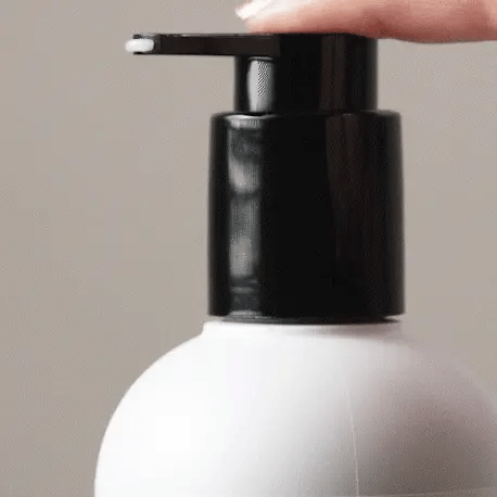 Gif of someone pumping Alcove Hair Styling Cream 250 ml showing texture